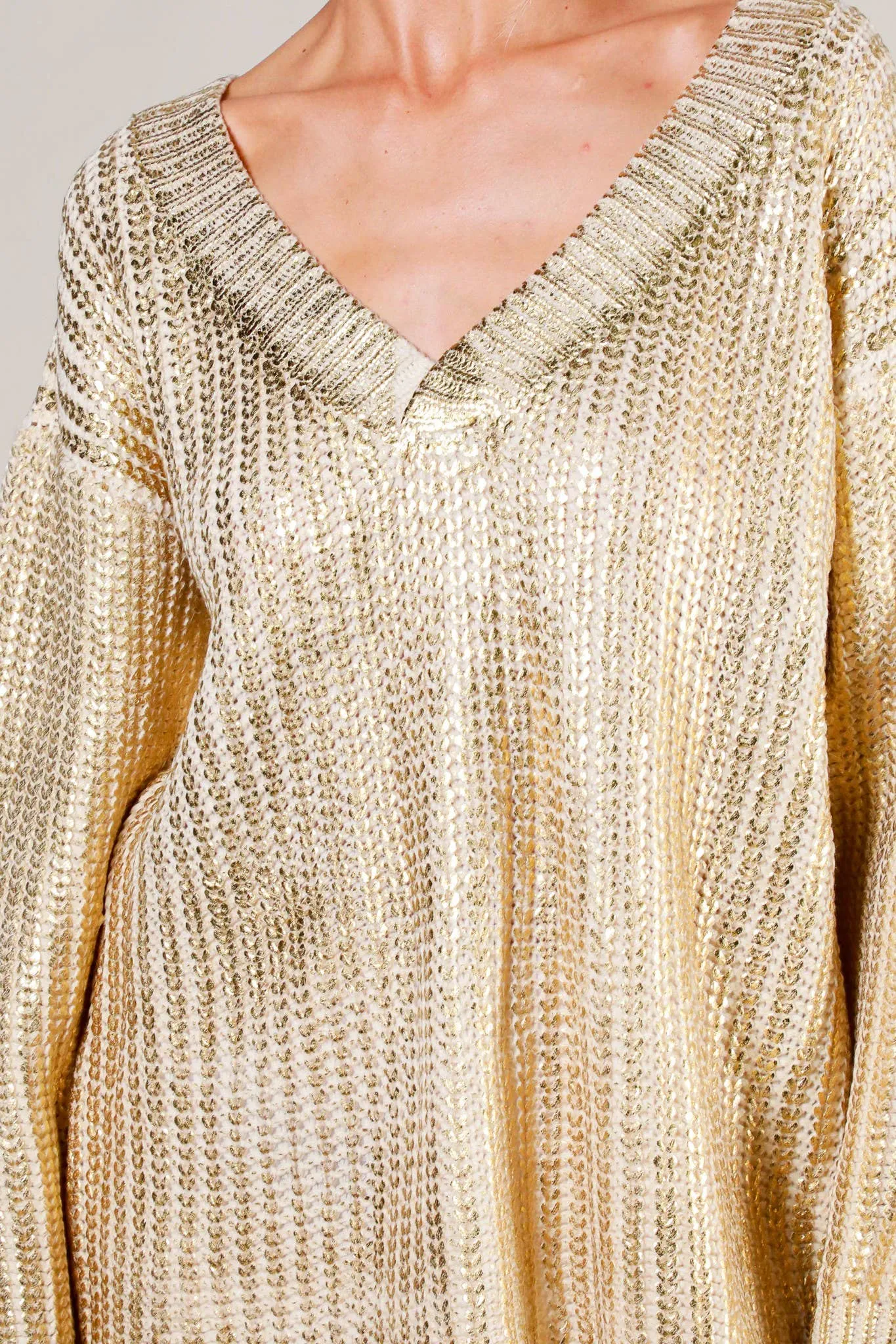 A Shining Statement Gold Metallic Sweater