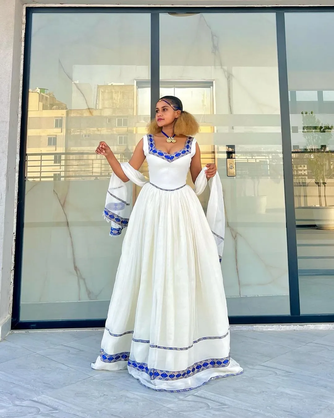 Radiate Elegance in Our Modern Habesha Dress Gorgeous Blue Ethiopian Dress